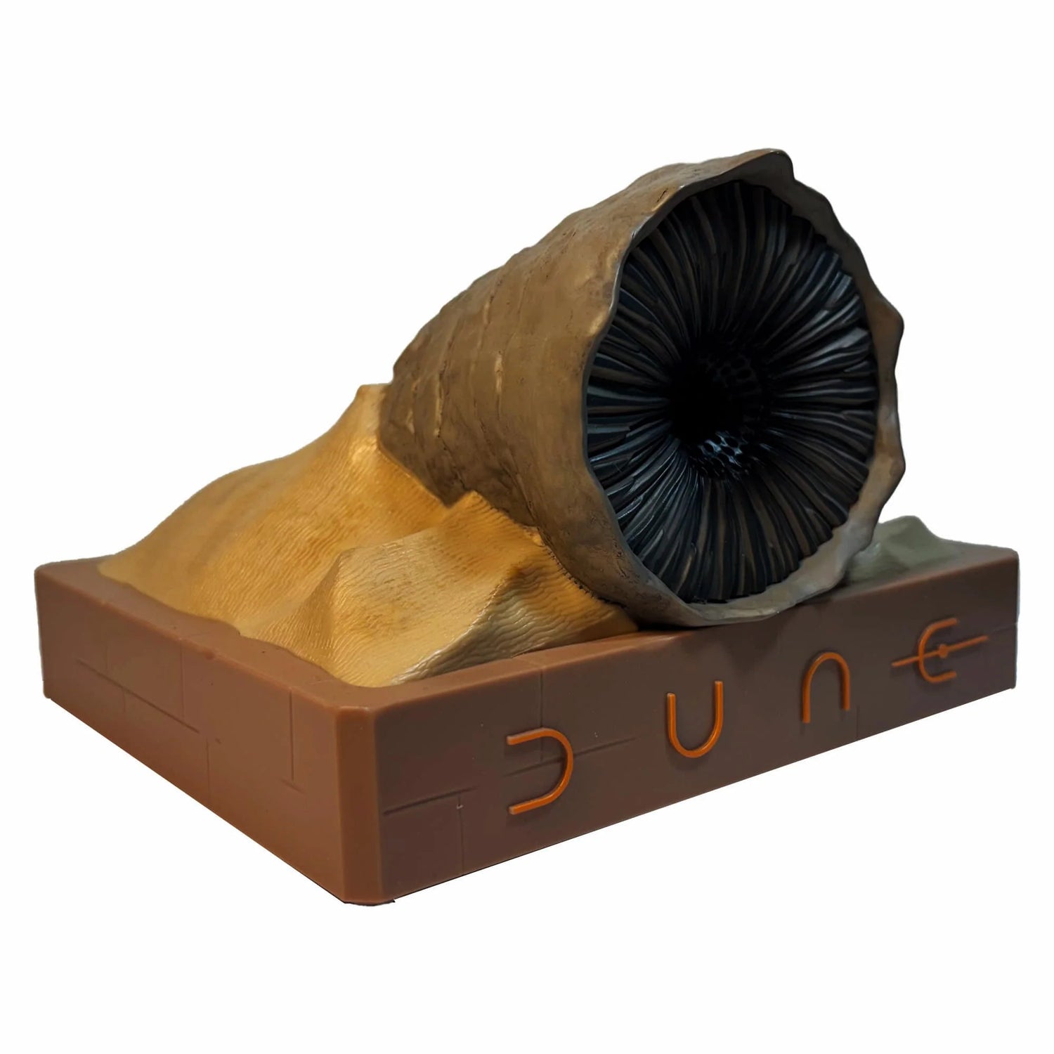 Dune Shai-Hulud Sandworm Bluetooth Speaker angled front view on a limestone base