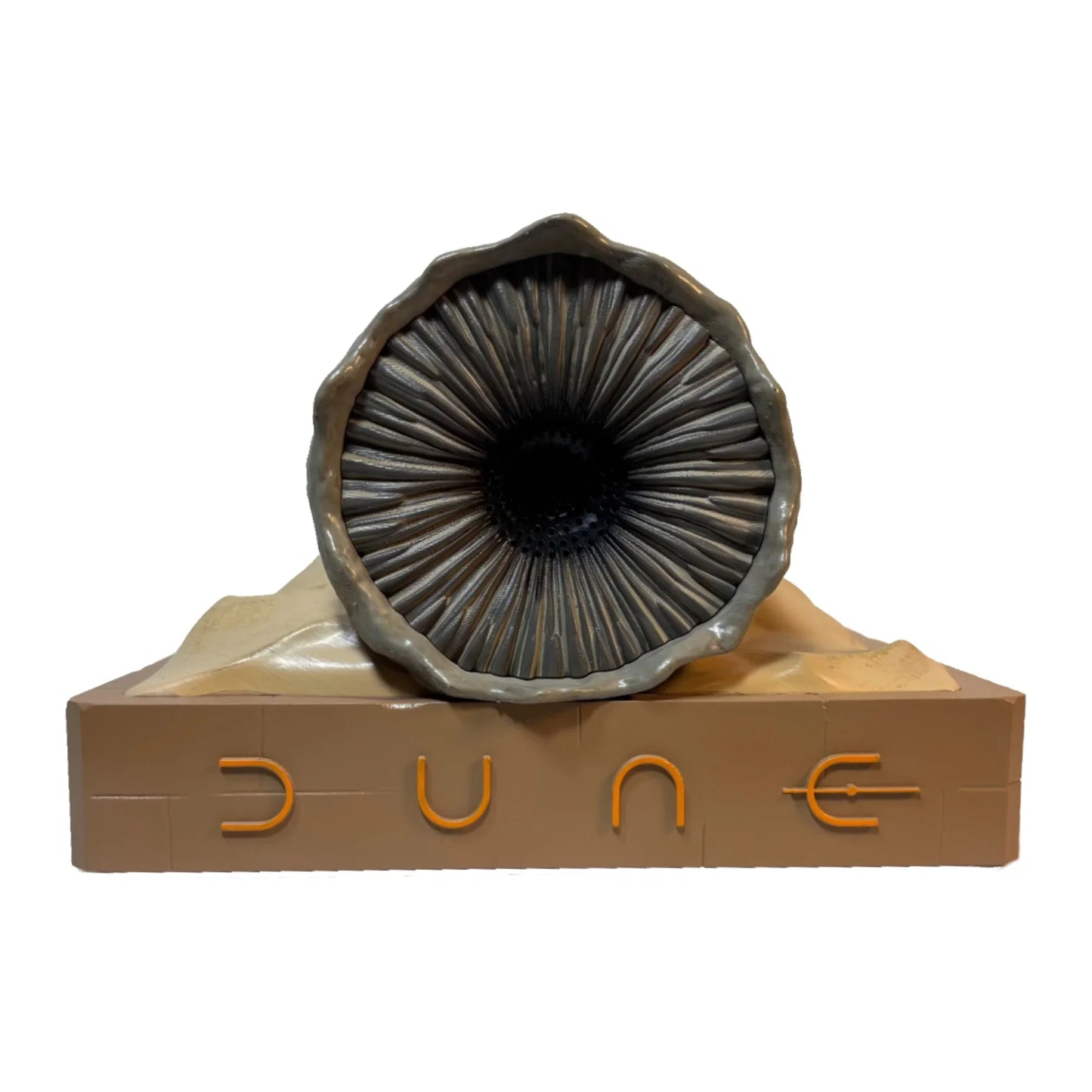 Angle shot showing the detailed cinematic sculpting of the sandworm crest