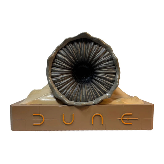 Dune Shai-Hulud Sandworm Bluetooth Speaker angled front view on a limestone base-9