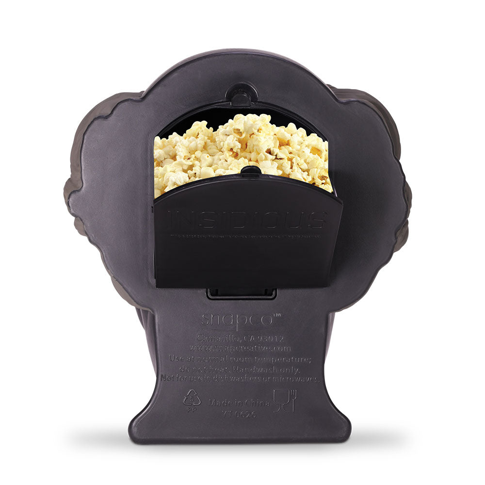 Lipstick Demon popcorn bucket displayed on a shelf