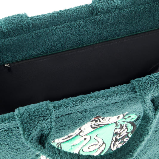 Front view of green sherpa travel tote featuring the Slytherin house crest-5