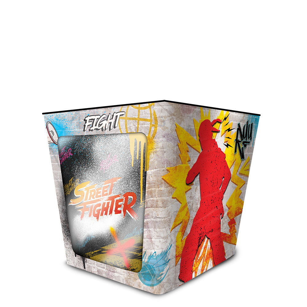 Lifestyle setting featuring the Street Fighter popcorn tin displayed on a gaming shelf