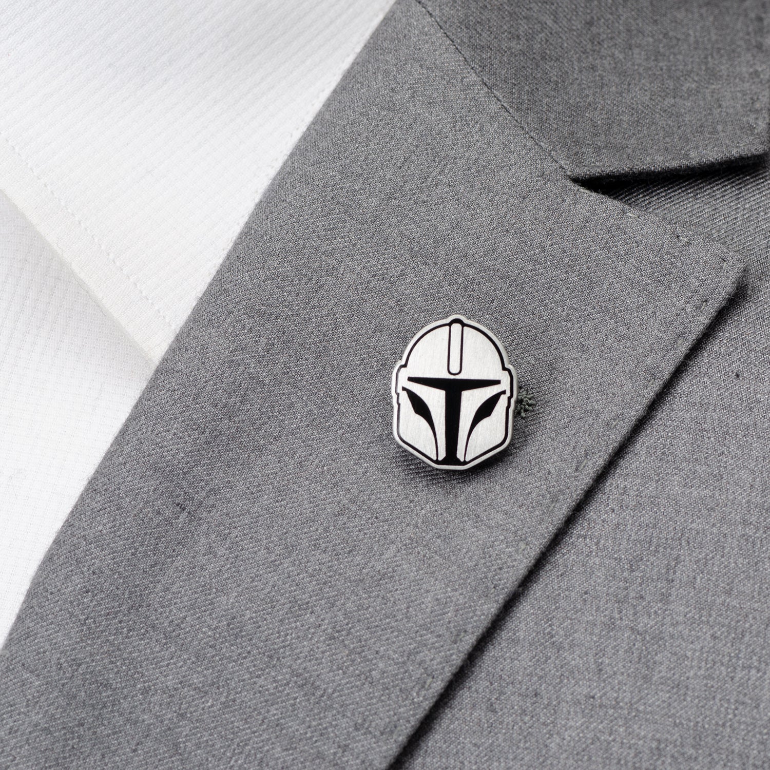 Side profile of the Star Wars Din Djarin helmet pin showing metal thickness