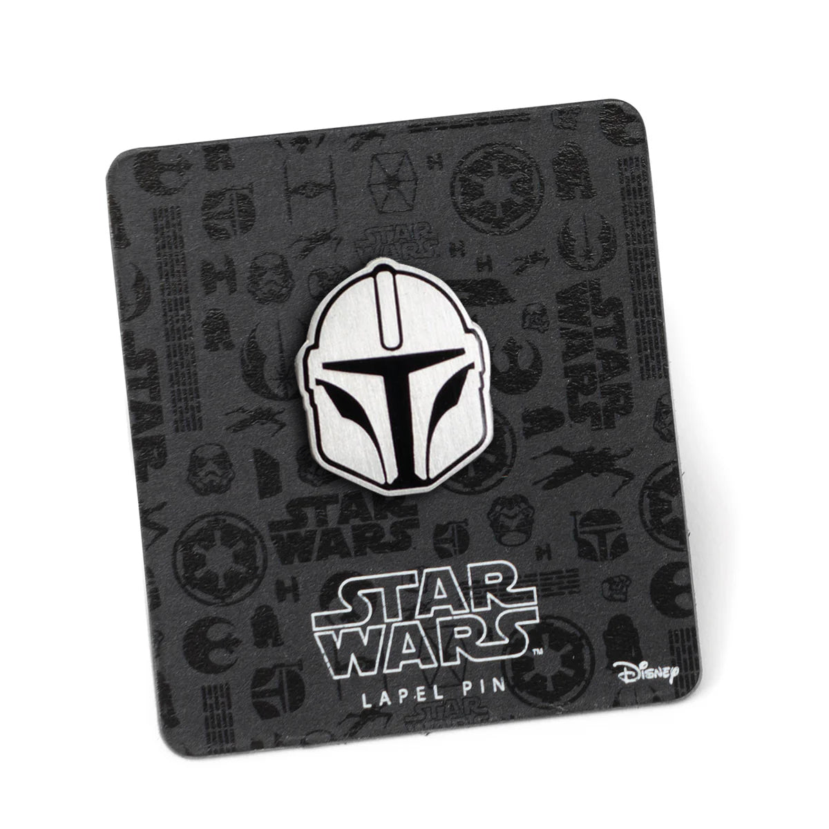 Mandalorian helmet pin displayed on a jacket lapel for scale