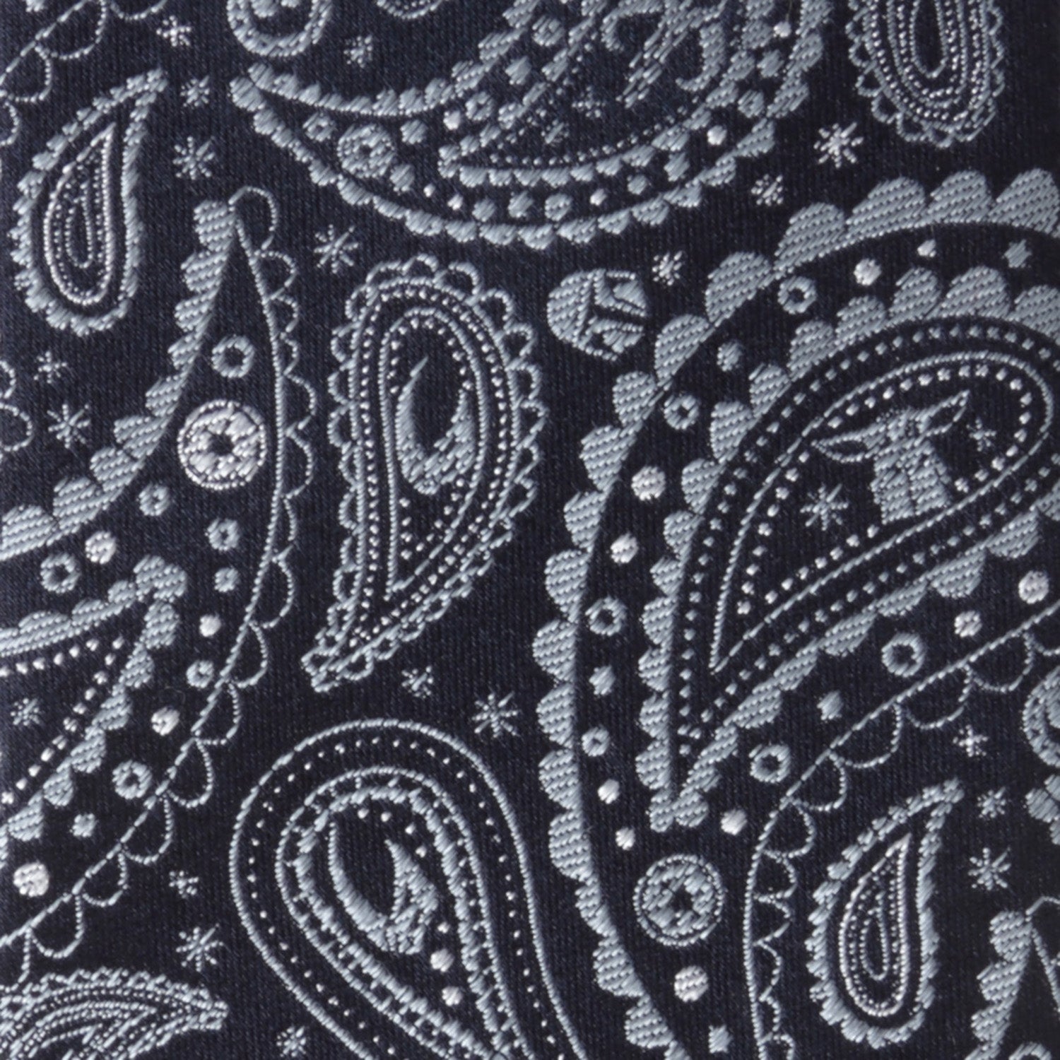 Lifestyle view of the Star Wars paisley tie paired with a dress shirt