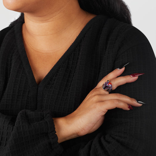 Close-up view of the Star Wars x RockLove Sabine Wren Helmet Ring highlighting orange and purple enamel.-4