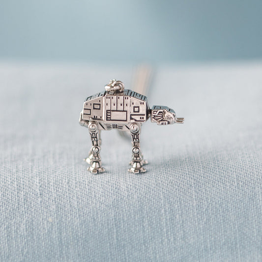 Close up of sterling silver AT-AT pendant showing fine mechanical details.-3