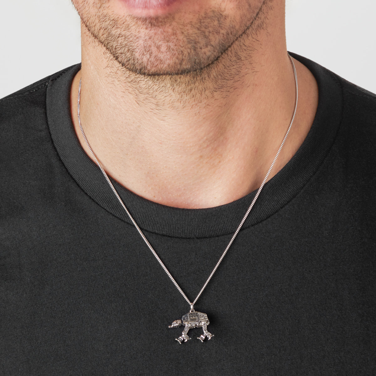 Side view of the three dimensional AT-AT walker pendant in sterling silver.