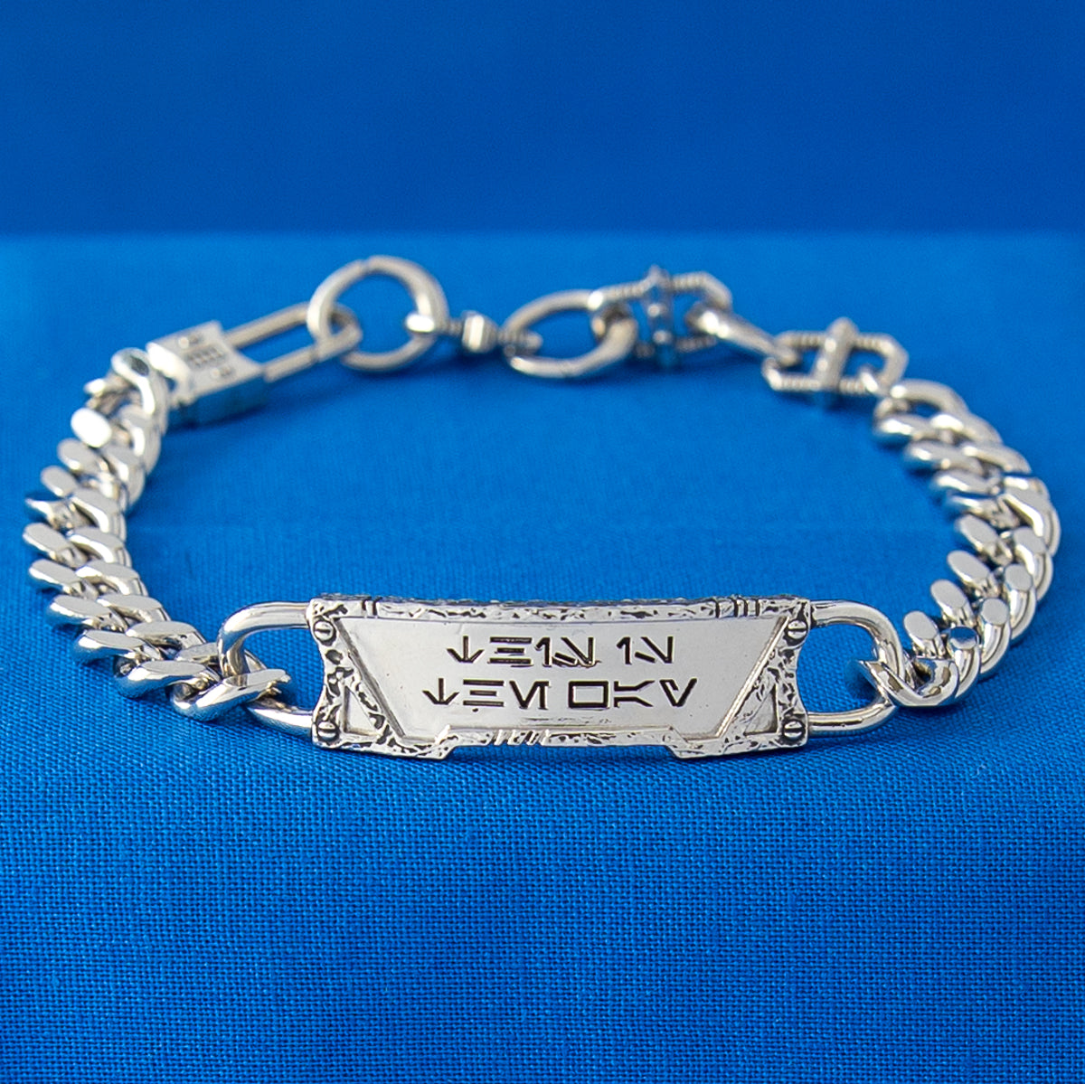 Sculpted clasp and adjustable links on the Star Wars artisan brass bracelet