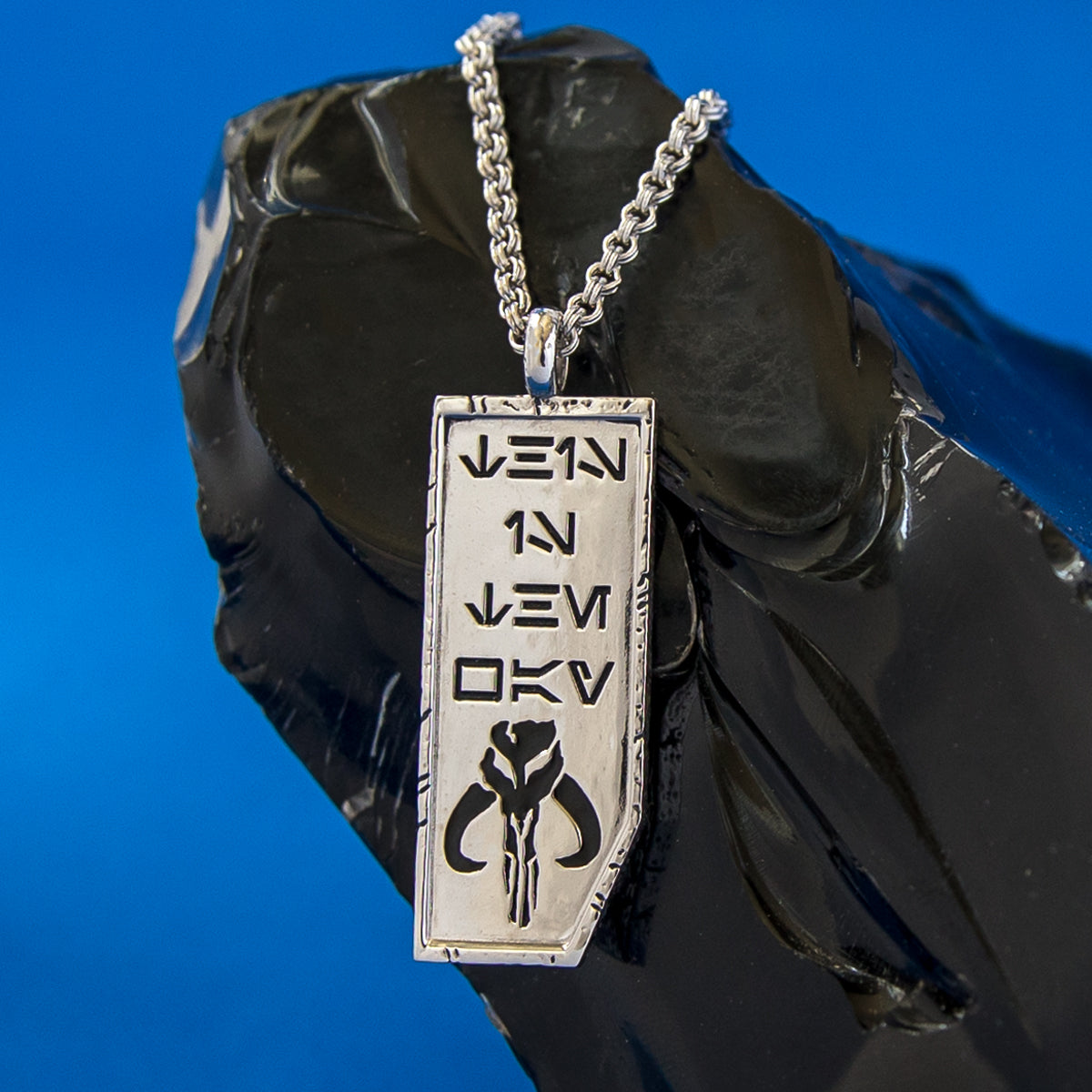 Back view of the weathered finish on the Mandalorian This is the Way pendant
