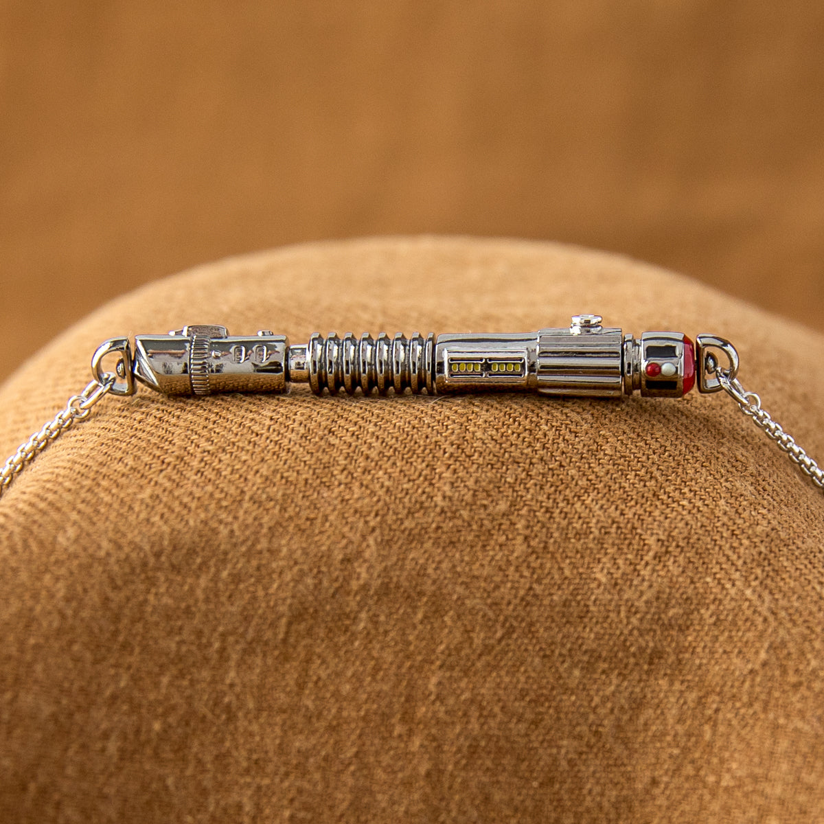 Model wearing the Lightsaber pendant showing the 57mm length.