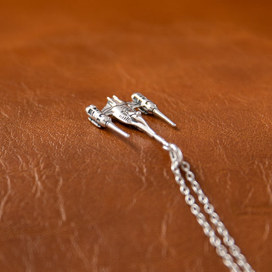 Close-up of Star Wars Naboo N-1 Starfighter necklace in sterling silver.-5