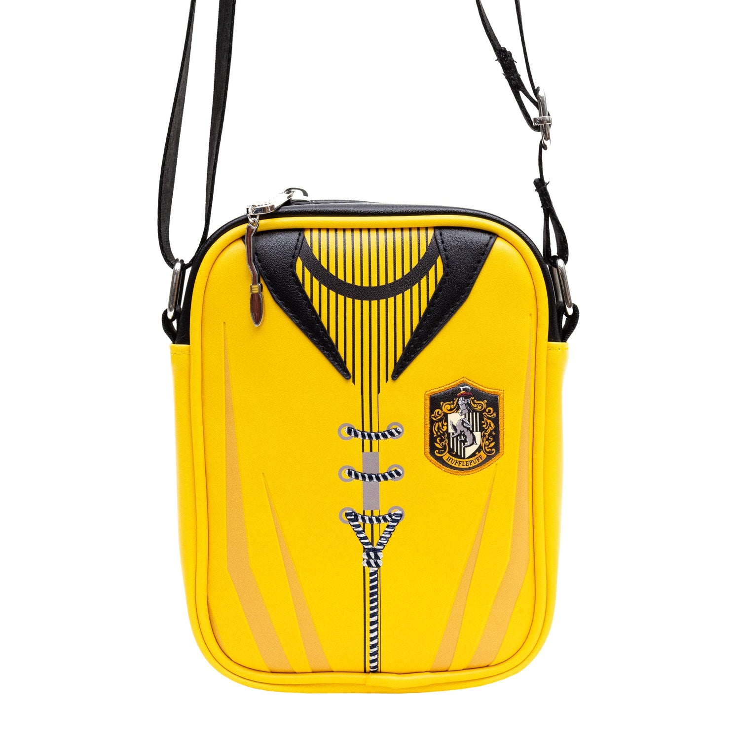 Detailed shot of the Hufflepuff Quidditch uniform artwork and crest on the front of the vegan leather bag.